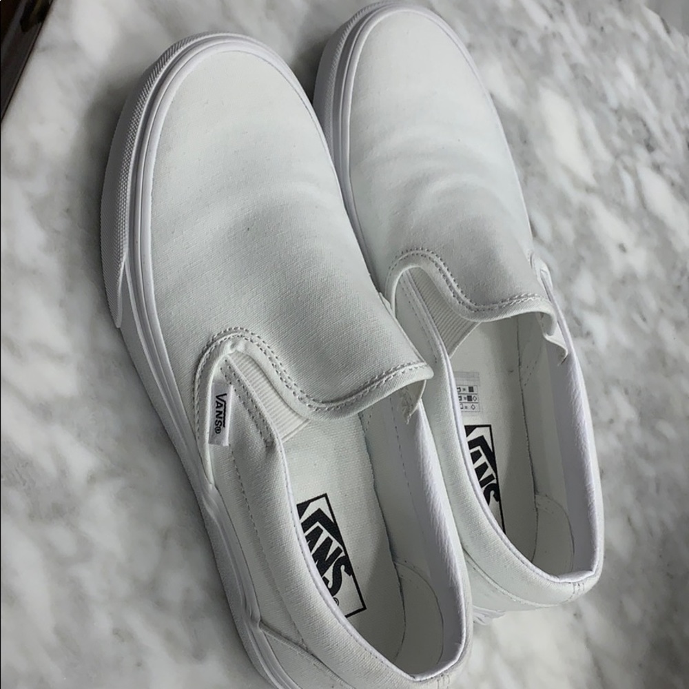 White slip on vans